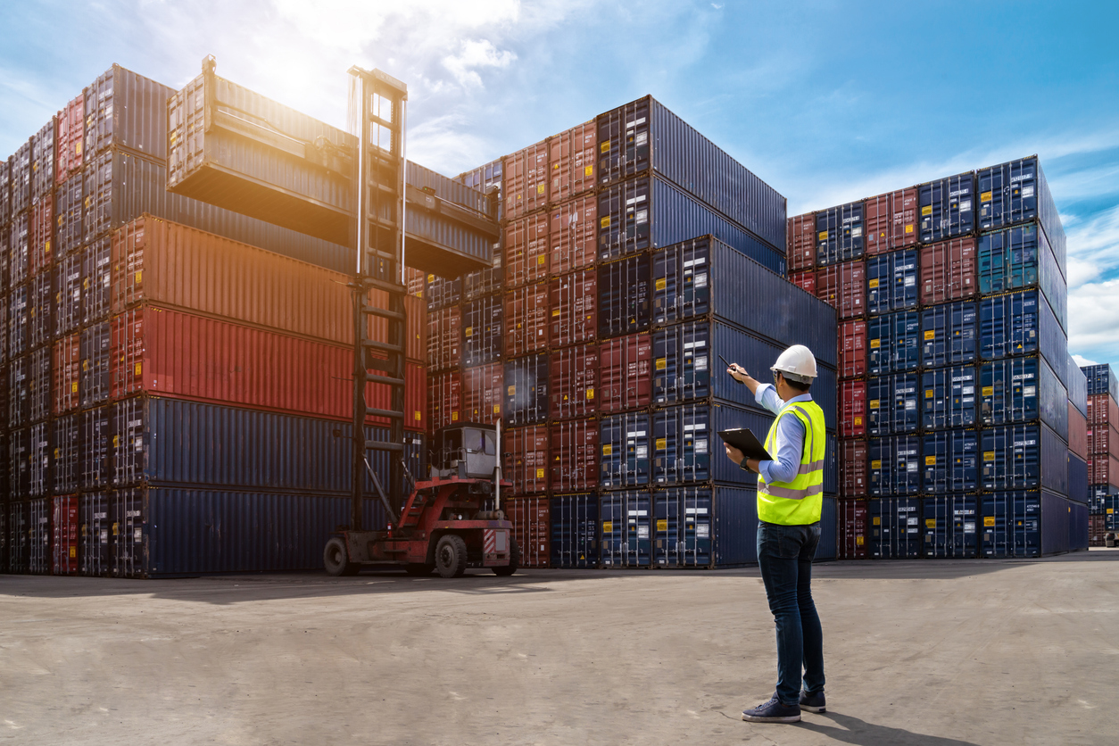 Shipping containers being inspected.